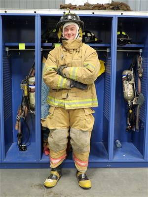 Piedmont High senior Roman Durant in firefighter gear